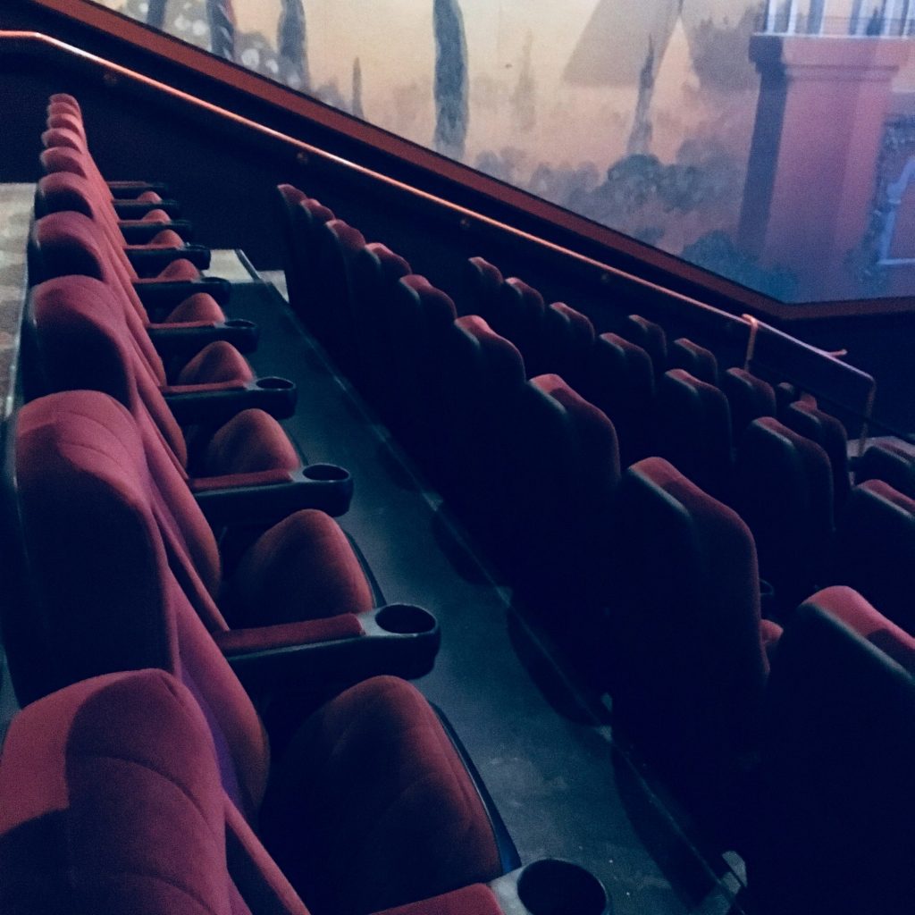 Rows of seats in movie theatre